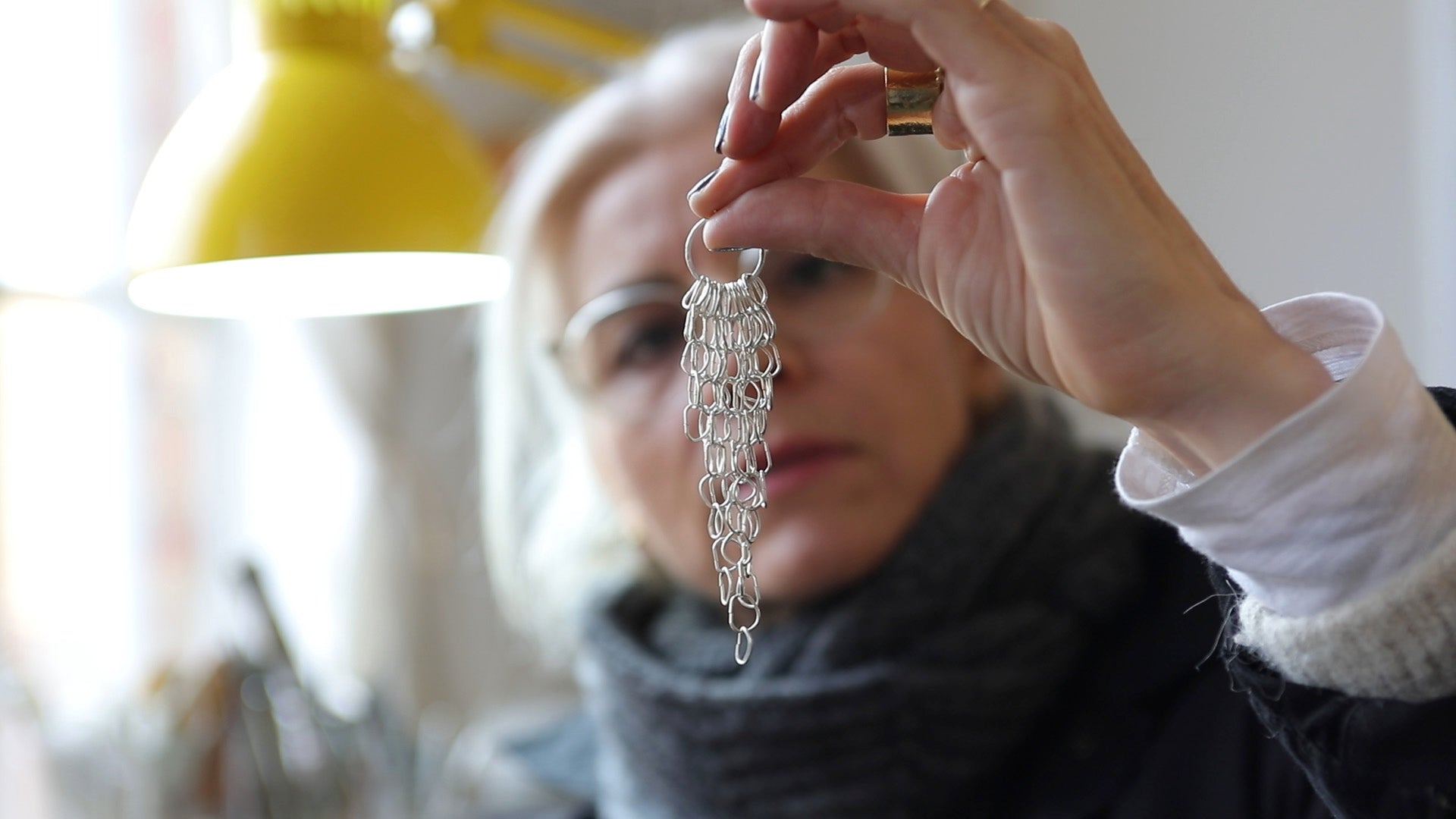 Load video: Bea Jareno Jewellery at her London studio looking at a pair of cascade earrings making